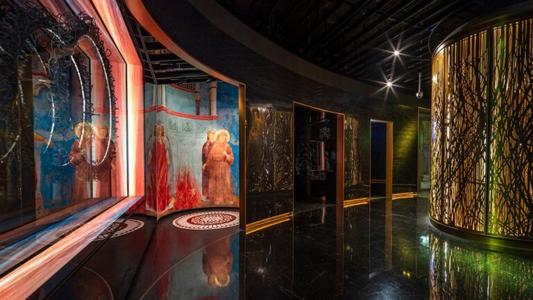 Contemporary exhibition environment within the Holy See Pavilion.
